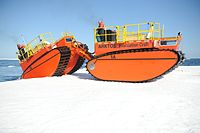Arktos Developments personnel drive an amphibious craft onto an ice floe during a demonstration for the U.S. Coast Guard, 10 miles off the coast of Barrow, Alaska 120813-G-YE680-117.jpg