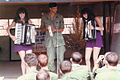 Vietnam Twins w soldier holding tamboreen.jpg